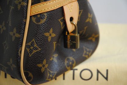 monogram canvas Louis Vuitton Tivoli PM monogram canvas satchel, Length: 14.2 in (36 cm) at widest point Height: 8.3 in (21 cm) Depth: 6.7 in (17 cm) Handle Drop: 6 in (15 cm)