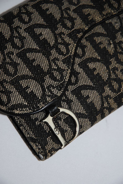 black and grey Christian Dior OBLIQUE TROTTER LONG WALLET, Dimensions: Approx. 7.5” L × 4.25” H × 1” D