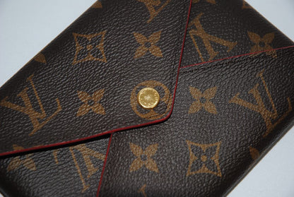 red and monogram Louis Vuitton Monogram Envelope-Style Wallet, Width: 4.7 to 5.5 in (12–14 cm) Height: 3.5 to 4.5 in (9–11.5 cm) Depth: 0.75 to 1.25 in (2–3 cm)