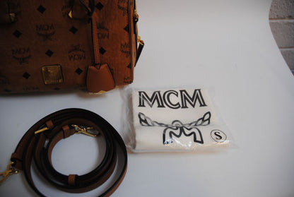 cognac MCM Essential Boston Bag – Medium, Length: 11.8 in (30 cm) Height: 7.5 in (19 cm) Depth: 6.7 in (17 cm) Handle Drop: 4 in (10 cm) Strap Drop: Adjustable up to 22 in (crossbody)