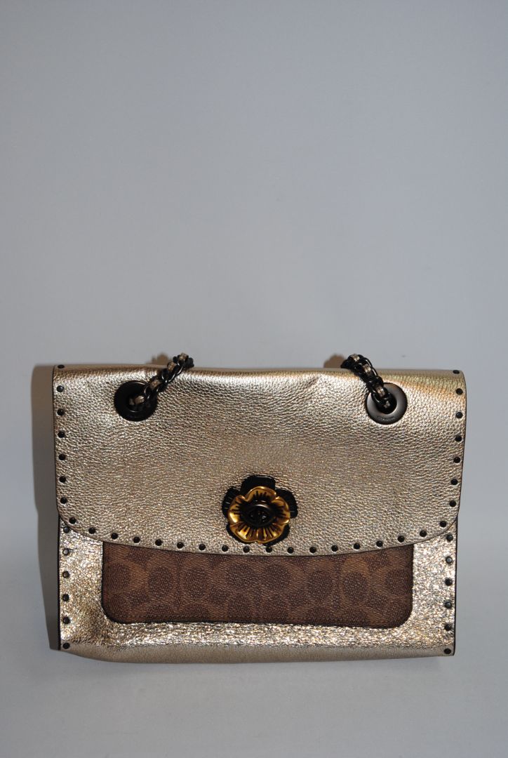 rose gold Coach Parker Shoulder Bag with Tea Rose Turnlock, Length: 10 in (25.5 cm) Height: 6.5 in (16.5 cm) Depth: 3.5 in (9 cm) Strap Drop: 11.5 in (doubled), 21 in (long crossbody)