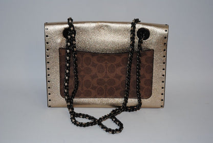 rose gold Coach Parker Shoulder Bag with Tea Rose Turnlock, Length: 10 in (25.5 cm) Height: 6.5 in (16.5 cm) Depth: 3.5 in (9 cm) Strap Drop: 11.5 in (doubled), 21 in (long crossbody)