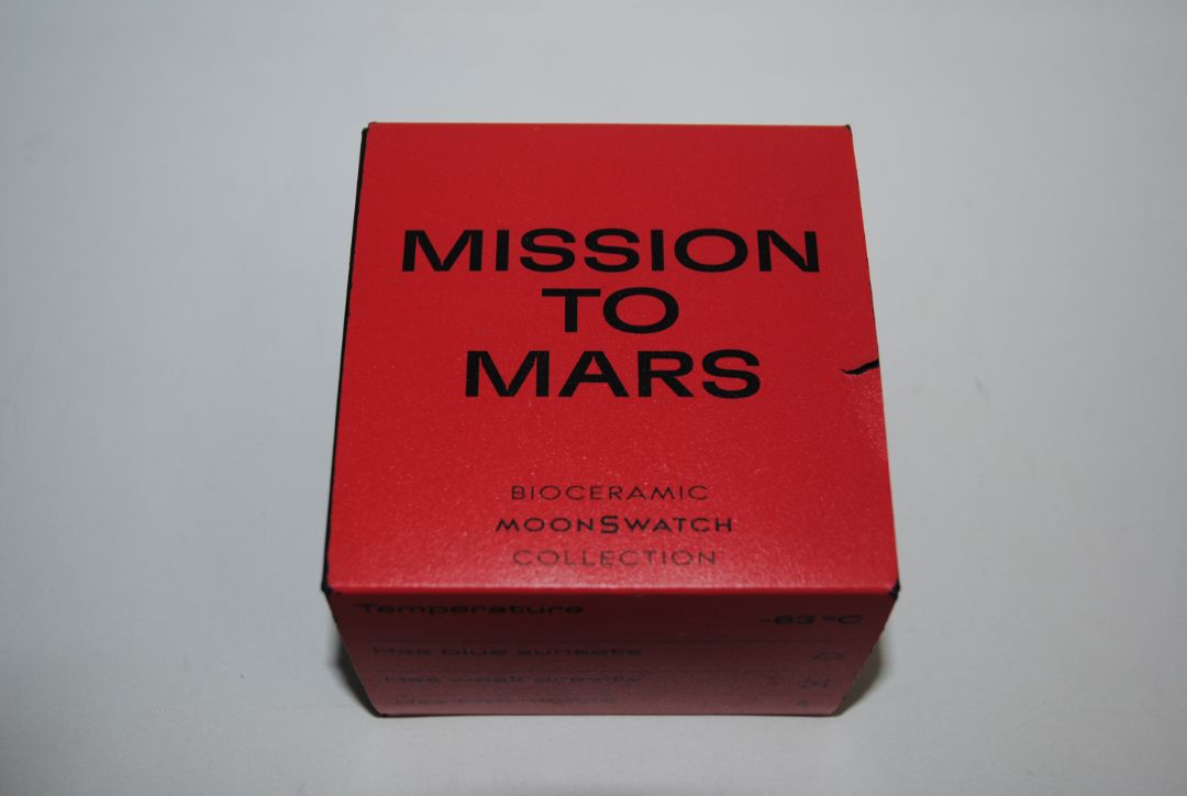 red and white Omega x Swatch Bioceramic Moonswatch “Mission to Mars”, Case Size: 42 mm Case Thickness: 13 mm Strap: Velcro fabric strap, adjustable