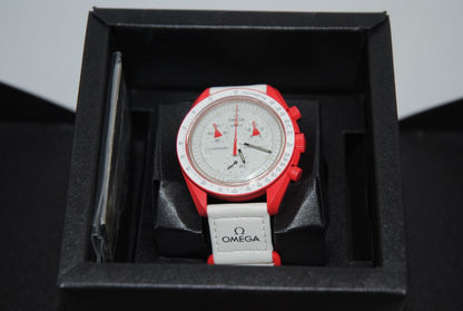 red and white Omega x Swatch Bioceramic Moonswatch “Mission to Mars”, Case Size: 42 mm Case Thickness: 13 mm Strap: Velcro fabric strap, adjustable