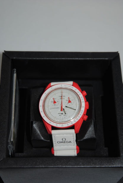 red and white Omega x Swatch Bioceramic Moonswatch “Mission to Mars”, Case Size: 42 mm Case Thickness: 13 mm Strap: Velcro fabric strap, adjustable
