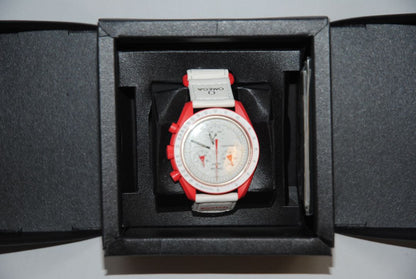 red and white Omega x Swatch Bioceramic Moonswatch “Mission to Mars”, Case Size: 42 mm Case Thickness: 13 mm Strap: Velcro fabric strap, adjustable