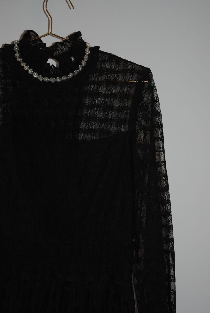 black Sandro lace tiered dress with sleeves and pearls, Dimensions / Fit: Knee-length (approx. 36–38”), fitted waist, high neck