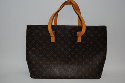 monogram Louis Vuitton monogram tote, Dimensions (approx): 15” L x 11” H x 5.5” D Handle Drop: 9” (fits comfortably over the shoulder)