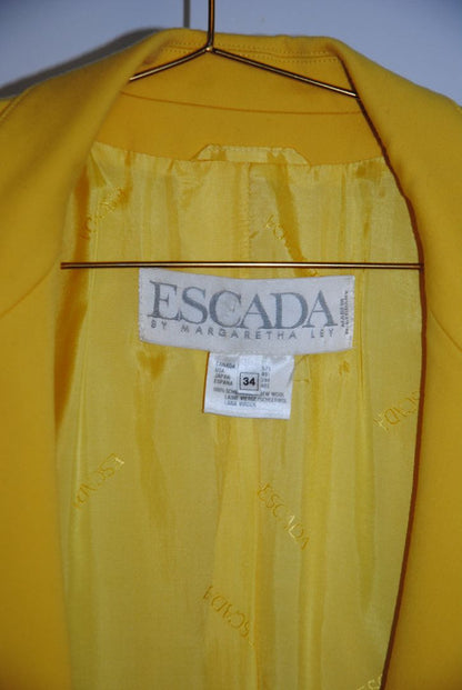 sunshine yellow Escada Double-Breasted Wool Blazer, Size: EU 34 (US 2–4) Length: Approx. 25 in / 64 cm Chest Width: Approx. 17 in / 43 cm (flat lay) Sleeve Length: Approx. 23 in / 58 cm Fit: Tailored, structured silhouette