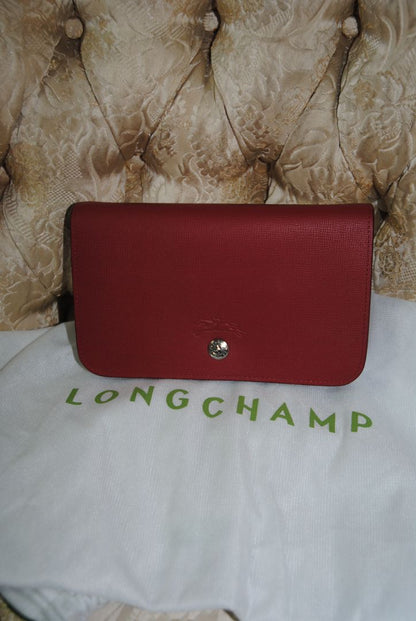 red Longchamp Le Foulonné Red Leather Crossbody Chain Bag, Dimensions Height: 5.5 in (14 cm) Width: 8.5 in (22 cm) Depth: 2 in (5 cm) Chain Strap Drop: 22 in (56 cm)