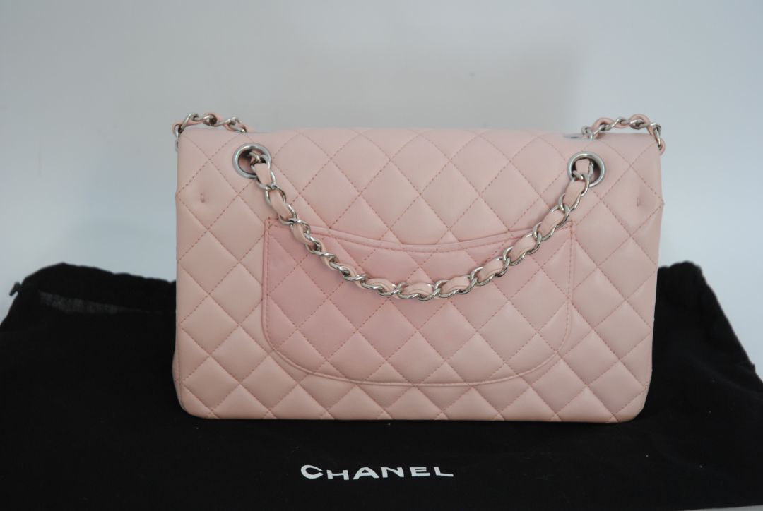 pink Chanel classic double flap, 25 cm width × ~16 cm height × ~7 cm depth (≈10″ × 6.3″ × 2.75″)