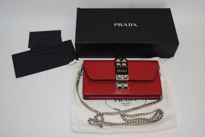 crimson red Prada flap chain bag, Width: 8.5 inches (21.5 cm) Height: 5 inches (12.5 cm) Depth: 2 inches (5 cm) Chain Strap Drop: 22 inches (56 cm)