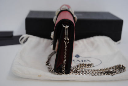 crimson red Prada flap chain bag, Width: 8.5 inches (21.5 cm) Height: 5 inches (12.5 cm) Depth: 2 inches (5 cm) Chain Strap Drop: 22 inches (56 cm)