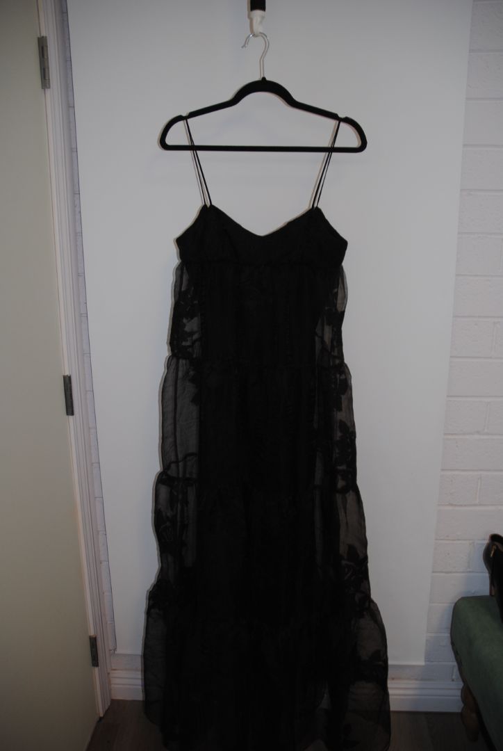 black Free People Black tiered chiffon, 4: Length: approx. 52-60 inches (since appears maxi) Waist: estimate ~26-28 inches (for standard size) Bust: estimate ~34-36 inches Strap drop: adjustable (spaghetti straps)