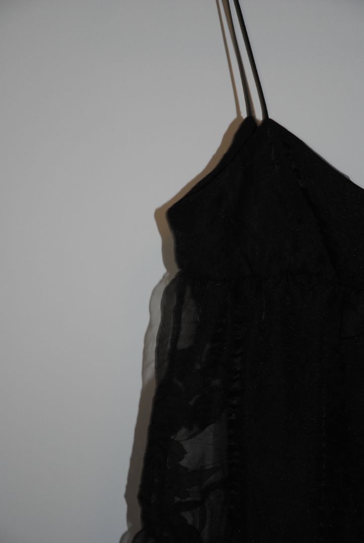 black Free People Black tiered chiffon, 4: Length: approx. 52-60 inches (since appears maxi) Waist: estimate ~26-28 inches (for standard size) Bust: estimate ~34-36 inches Strap drop: adjustable (spaghetti straps)