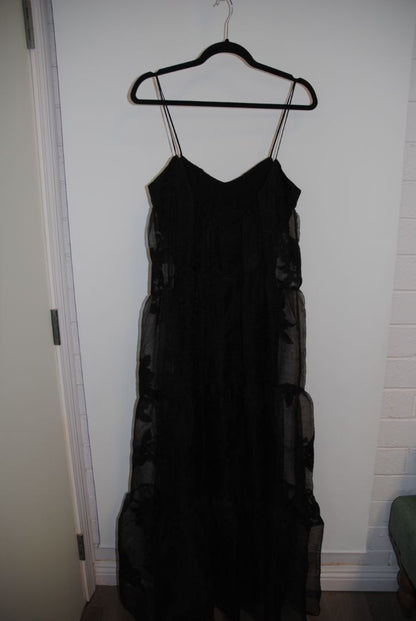 black Free People Black tiered chiffon, 4: Length: approx. 52-60 inches (since appears maxi) Waist: estimate ~26-28 inches (for standard size) Bust: estimate ~34-36 inches Strap drop: adjustable (spaghetti straps)