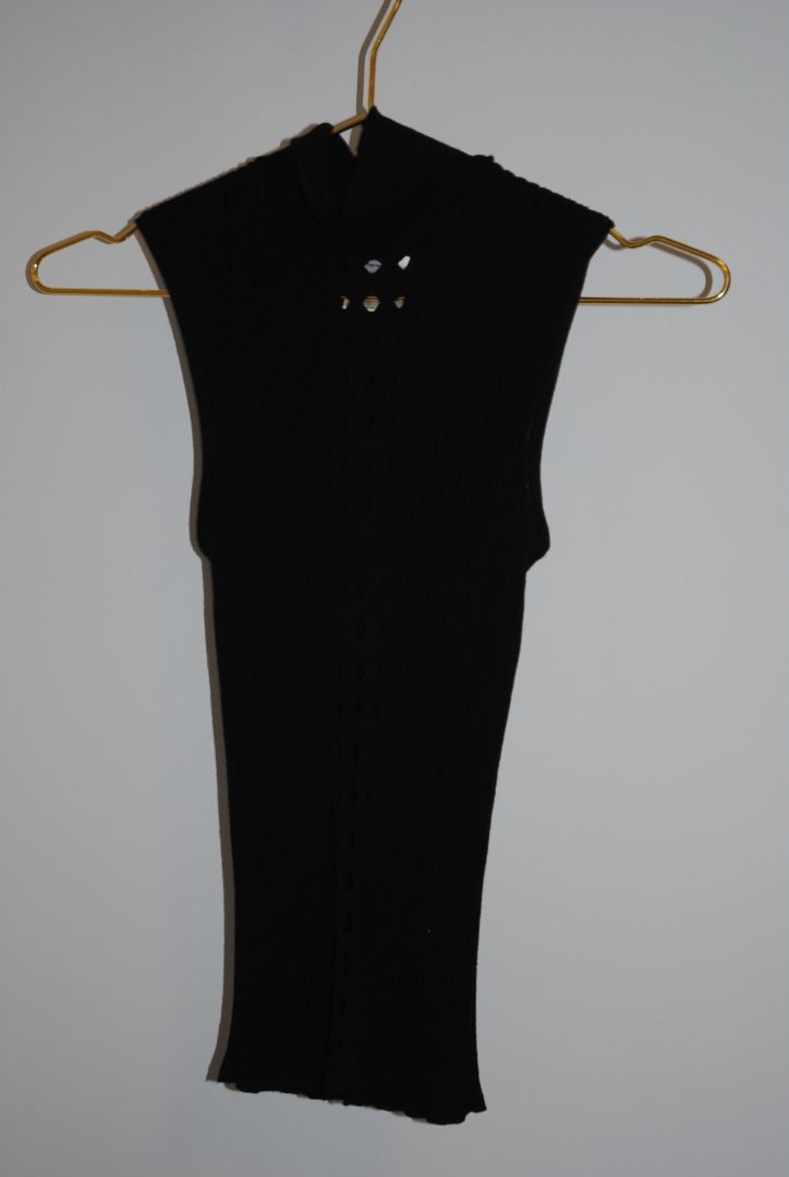 black Christian Dior wool knit top, Dimensions (Approximate): Length: 23 in (58 cm) Bust (flat): 14 in (36 cm) Waist (flat): 12 in (31 cm) Size: FR 40 / US 8 / UK 12 / DE 38