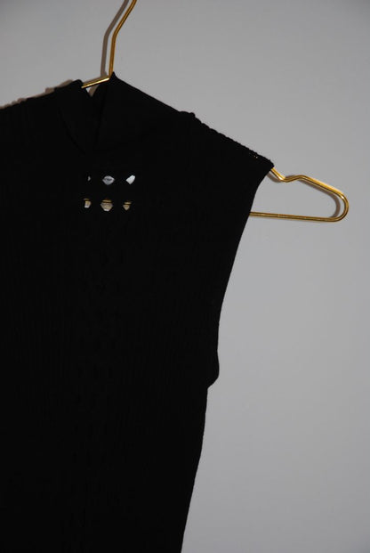 black Christian Dior wool knit top, Dimensions (Approximate): Length: 23 in (58 cm) Bust (flat): 14 in (36 cm) Waist (flat): 12 in (31 cm) Size: FR 40 / US 8 / UK 12 / DE 38