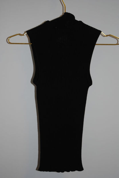 black Christian Dior wool knit top, Dimensions (Approximate): Length: 23 in (58 cm) Bust (flat): 14 in (36 cm) Waist (flat): 12 in (31 cm) Size: FR 40 / US 8 / UK 12 / DE 38