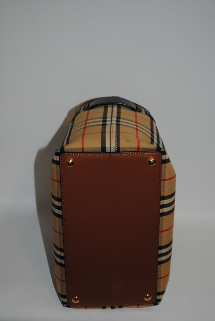 check monogram Burberry Burberry classic check tote with strap, Dimensions: Approx. 40 cm × 30 cm × 12–15 cm (i.e., ~15.7″ W × ~11.8″ H × ~4.7–6″ D) — this falls in line with Burberry’s “Medium Check Tote” style. For example, one similar bag measures W ≈