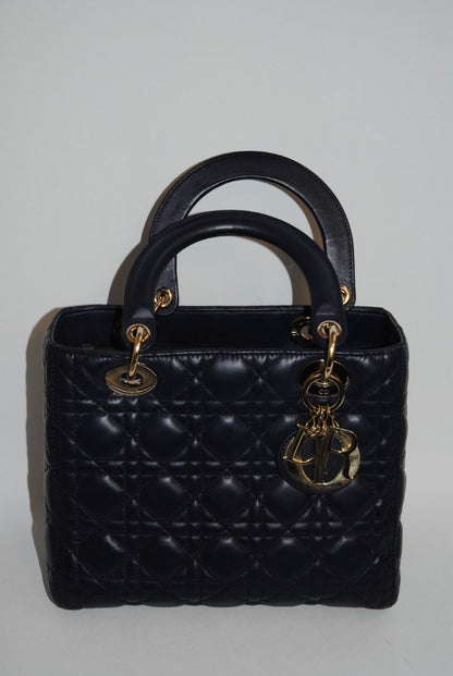 navy blue Christian Dior Dior Lady Dior Medium, Height: ~20 cm / 8 in Width: ~24 cm / 9.5 in Depth: ~11–12 cm / 4.5 in