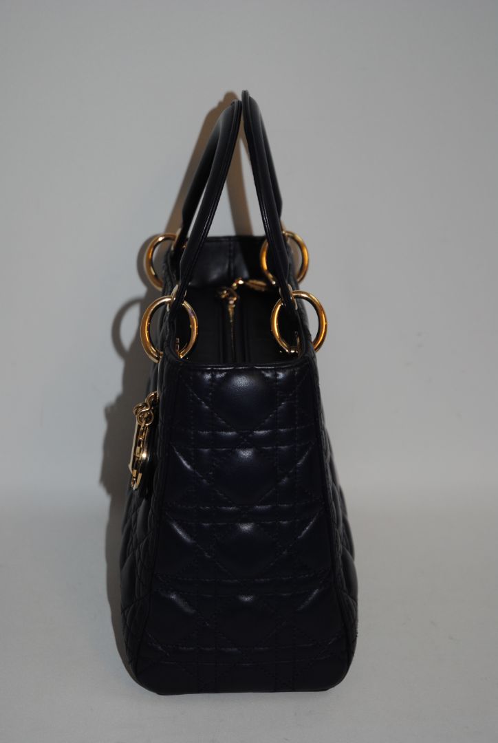 navy blue Christian Dior Dior Lady Dior Medium, Height: ~20 cm / 8 in Width: ~24 cm / 9.5 in Depth: ~11–12 cm / 4.5 in