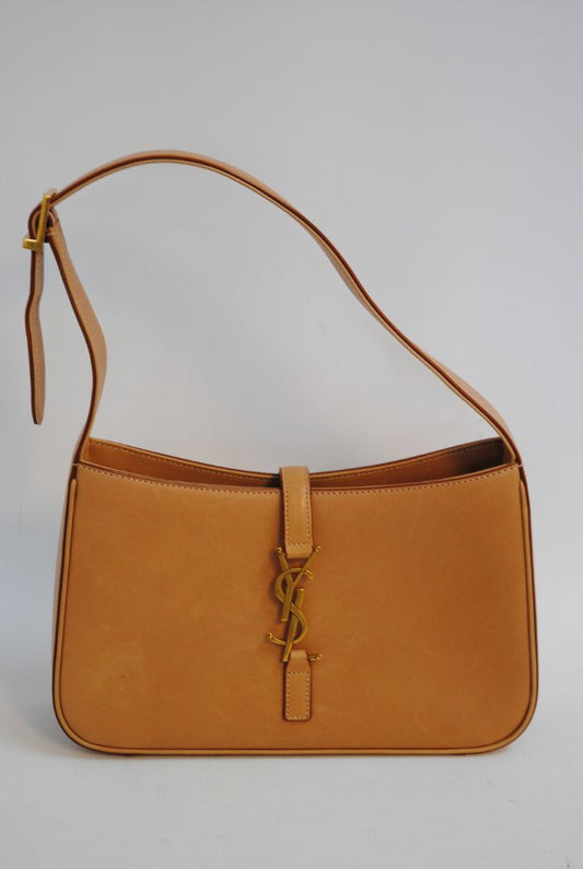 tan/ caramel Saint Laurent Model: Le 5 À 7 Hobo Bag, Length: 9.8 in (25 cm) Height: 5.5 in (14 cm) Depth: 2.4 in (6 cm) Strap Drop: 8.6–10.2 in (adjustable)