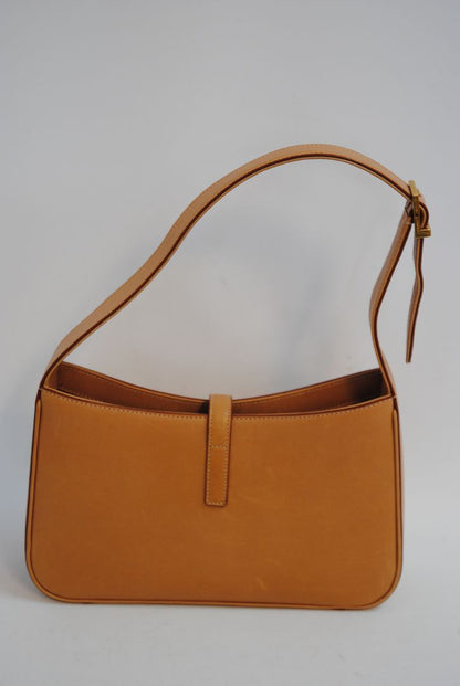 tan/ caramel Saint Laurent Model: Le 5 À 7 Hobo Bag, Length: 9.8 in (25 cm) Height: 5.5 in (14 cm) Depth: 2.4 in (6 cm) Strap Drop: 8.6–10.2 in (adjustable)