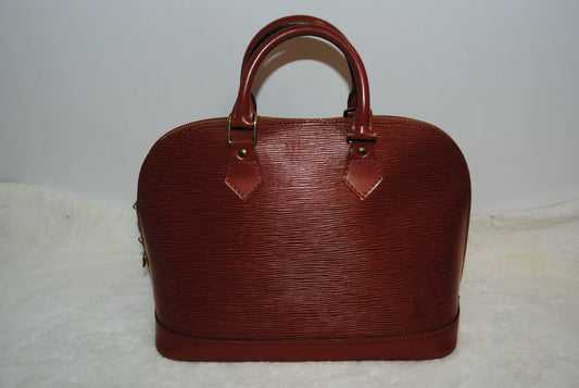 camel Louis Vuitton Epi Alma MM, Dimensions Length: 14.2 in (36 cm) Height: 10.6 in (27 cm) Depth: 6.7 in (17 cm)