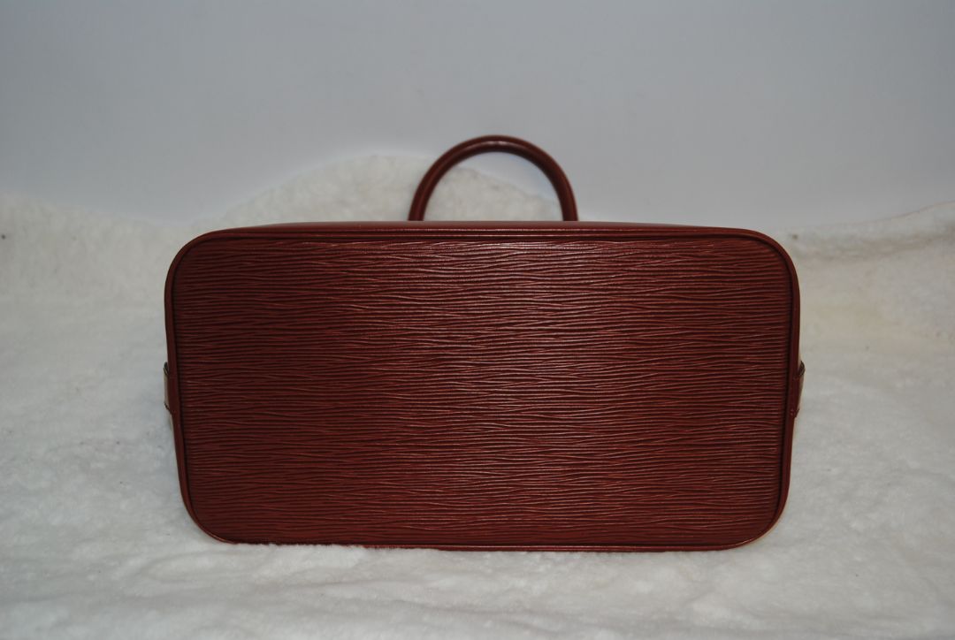 camel Louis Vuitton Epi Alma MM, Dimensions Length: 14.2 in (36 cm) Height: 10.6 in (27 cm) Depth: 6.7 in (17 cm)