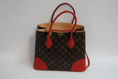 red brown and gold Louis Vuitton Locky Tote (larger size) / Monogram Tote with LV push-lock closure, Dimensions Length: 13 in Height: 10 in Depth: 6 in