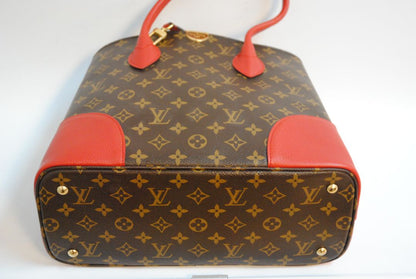 red brown and gold Louis Vuitton Locky Tote (larger size) / Monogram Tote with LV push-lock closure, Dimensions Length: 13 in Height: 10 in Depth: 6 in