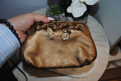 copper gold Braccialini Designer bag, Width: ~12 in (30 cm) Height: ~7.5 in (19 cm) Depth: ~4 in (10 cm) Strap Drop: ~18–20 in (shoulder length)