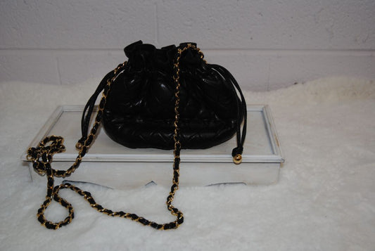 black and gold Cosci Lambskin leather bag, Width: ~7 in (18 cm) Height: ~6 in (15 cm) Depth: ~4 in (10 cm) Strap Drop: ~20–22 in (shoulder or crossbody)