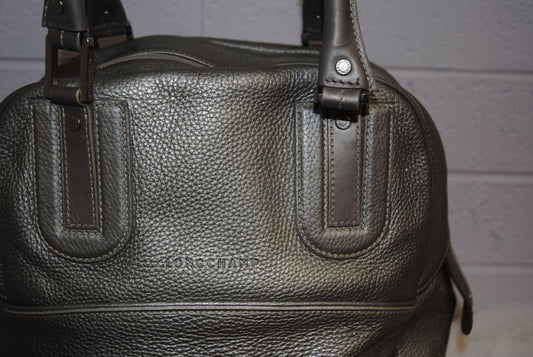 Metallic silver Longchamp bowling bag, Width: ~13 in (33 cm) Height: ~12 in (30 cm) Depth: ~5 in (13 cm) Handle Drop: ~5–6 in (hand or forearm carry)
