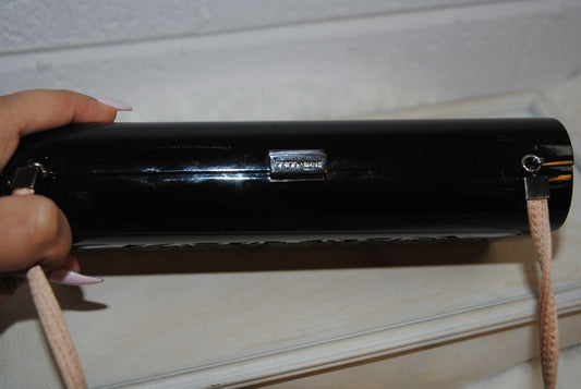 black and tan Giorgio Armani resin clutch, Width: ~8.75 in (22 cm) Height: ~4.25 in (10.8 cm) Depth: ~1.75 in (4.5 cm)