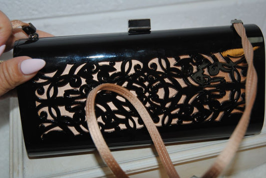 black and tan Giorgio Armani resin clutch, Width: ~8.75 in (22 cm) Height: ~4.25 in (10.8 cm) Depth: ~1.75 in (4.5 cm)