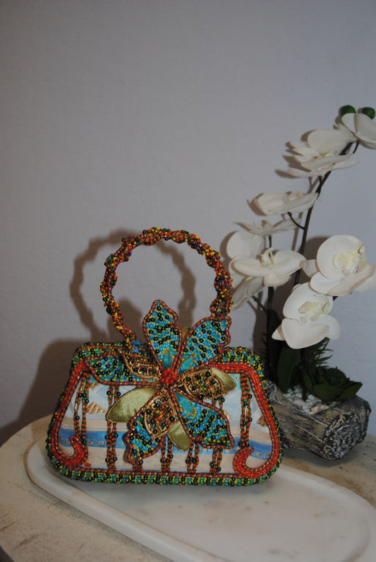 multi color Mary Frances handmade beaded bag, Width: 9–10 in Height: 6–7 in (without handle) Depth: 3–3.5 in Handle Drop: 4–5 in (handheld braided bead handle)