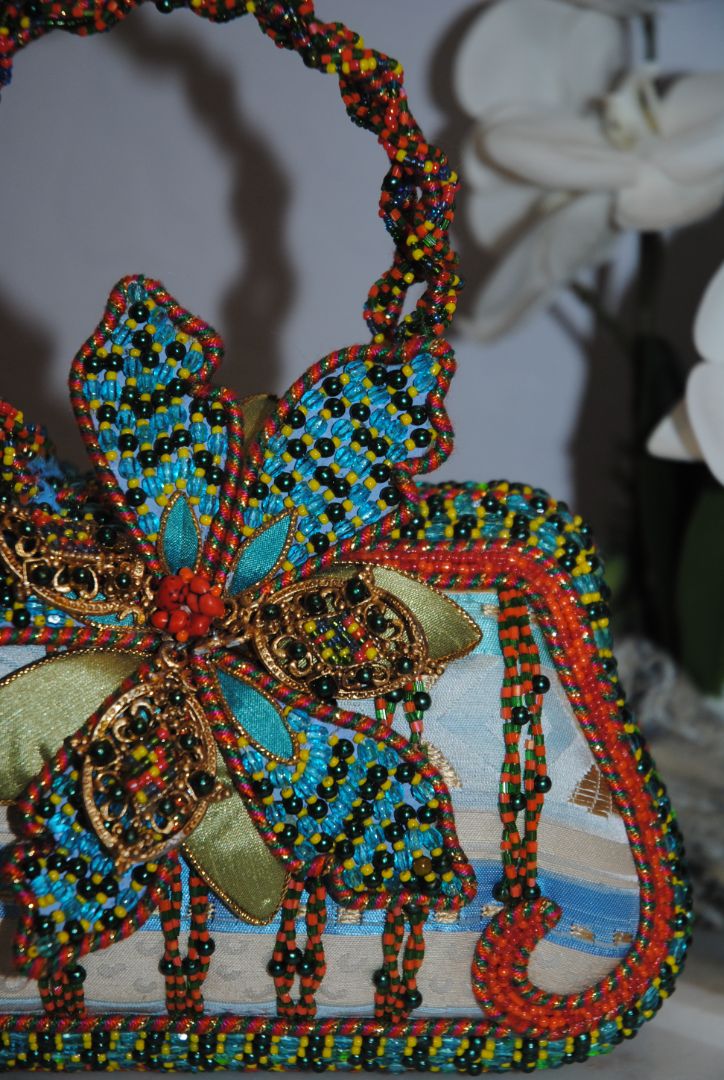 multi color Mary Frances handmade beaded bag, Width: 9–10 in Height: 6–7 in (without handle) Depth: 3–3.5 in Handle Drop: 4–5 in (handheld braided bead handle)