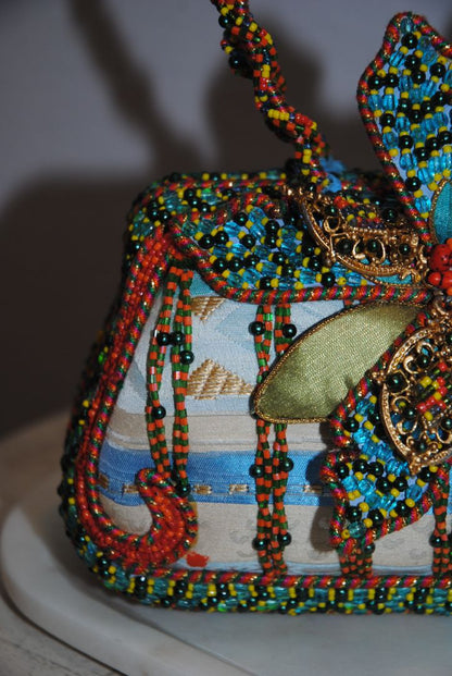 multi color Mary Frances handmade beaded bag, Width: 9–10 in Height: 6–7 in (without handle) Depth: 3–3.5 in Handle Drop: 4–5 in (handheld braided bead handle)