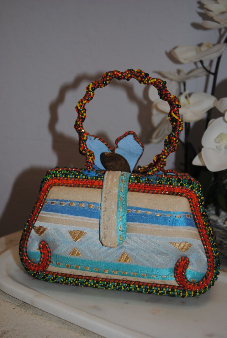 multi color Mary Frances handmade beaded bag, Width: 9–10 in Height: 6–7 in (without handle) Depth: 3–3.5 in Handle Drop: 4–5 in (handheld braided bead handle)
