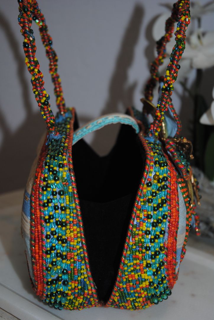 multi color Mary Frances handmade beaded bag, Width: 9–10 in Height: 6–7 in (without handle) Depth: 3–3.5 in Handle Drop: 4–5 in (handheld braided bead handle)