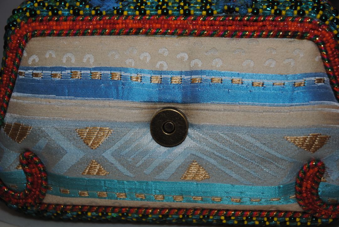 multi color Mary Frances handmade beaded bag, Width: 9–10 in Height: 6–7 in (without handle) Depth: 3–3.5 in Handle Drop: 4–5 in (handheld braided bead handle)