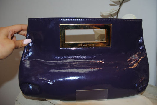 purple Michael Kors clutch with magnet closure, small