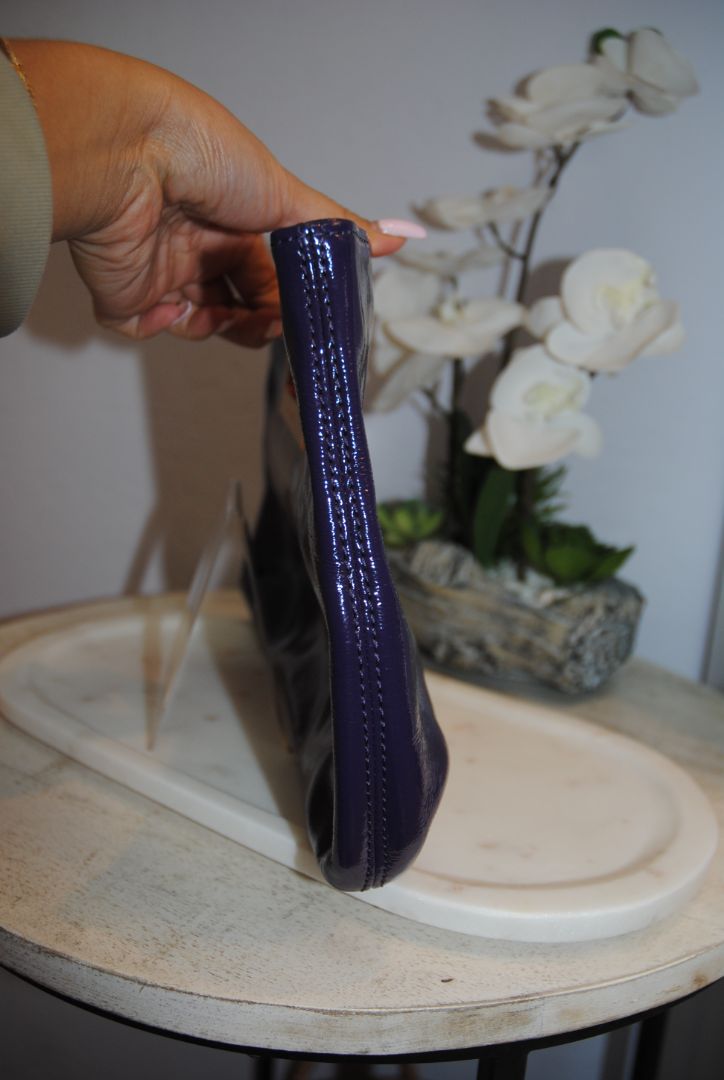purple Michael Kors clutch with magnet closure, small