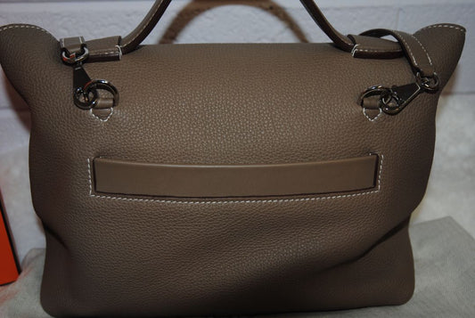 Color: Neutral Taupe / Etoupe family Hermès Hermes 24 x 24, Width: 11.5 in (24 cm) Height: 7 in (18 cm) Depth: 5 in (13 cm)