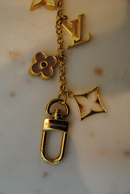 gold Louis Vuitton bag chain extender