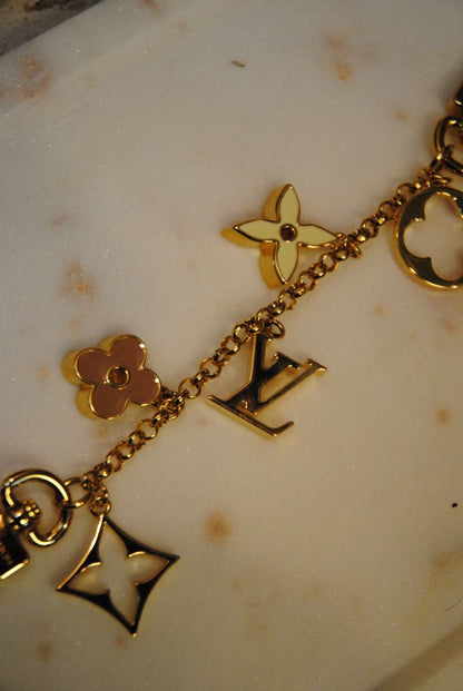 gold Louis Vuitton bag chain extender