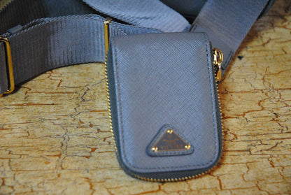 gray blue Prada re-edition 2005 saffiano leather shoulder bag with matching pouch