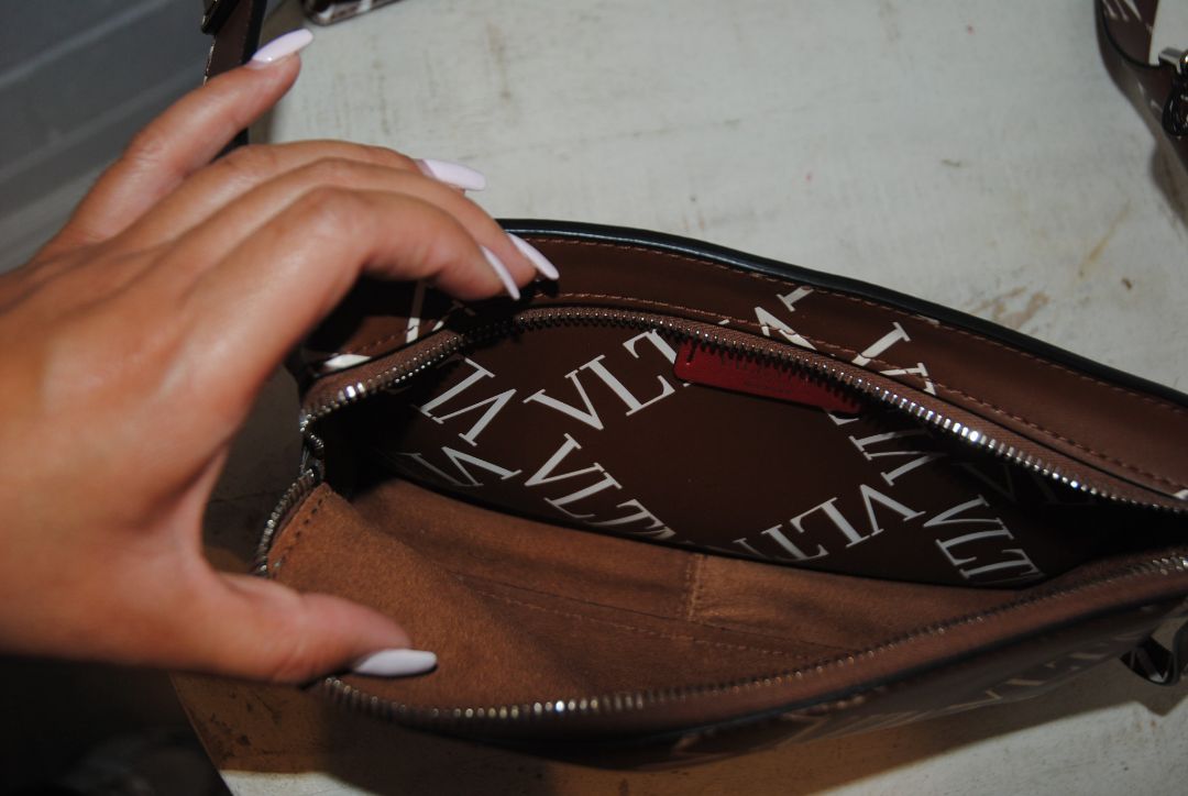 brown and white Valentino Logo leather crossbody bag